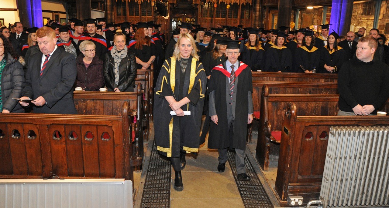 Academic procession entering church