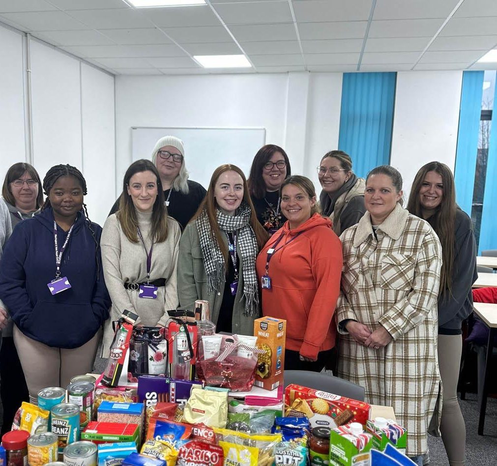 Access to HE Students donating food to food bank