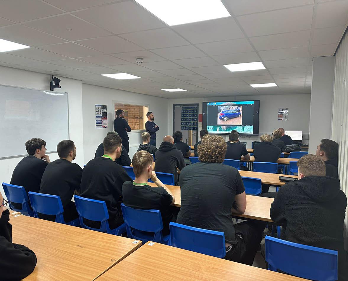Andrew talking to motor vehicle students