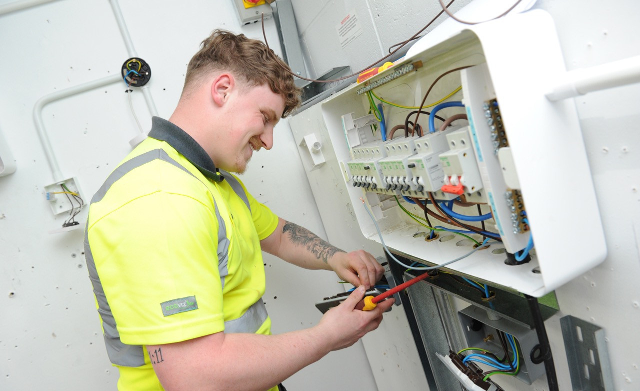 Male student working with wires (construction thumbnail image)