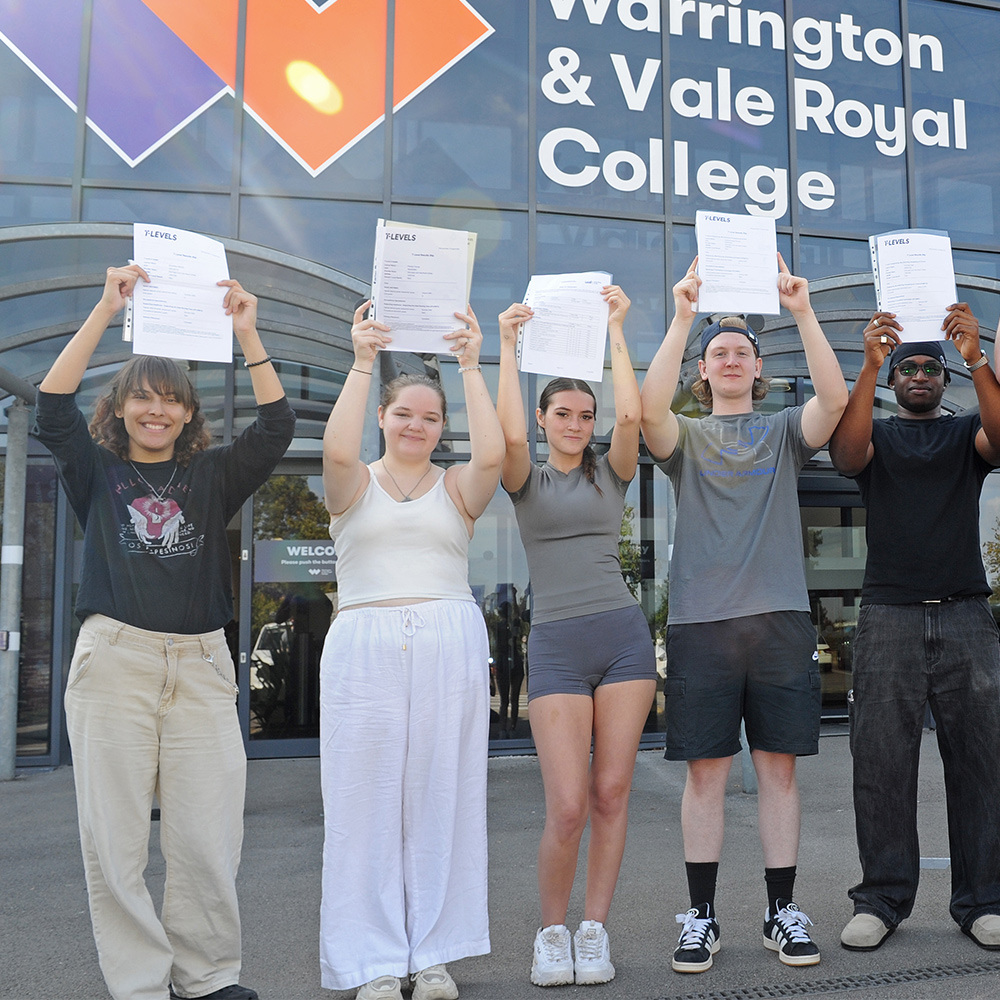 Group of students show there cerrtificates
