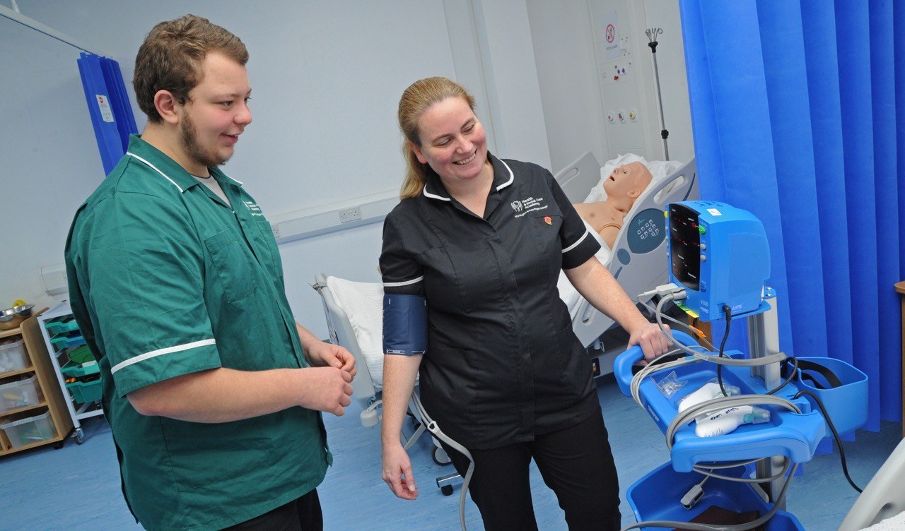 Student and tutor in simulation hospital ward (health thumbnail image)