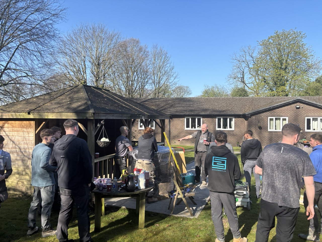 Students working on the fences and pergola