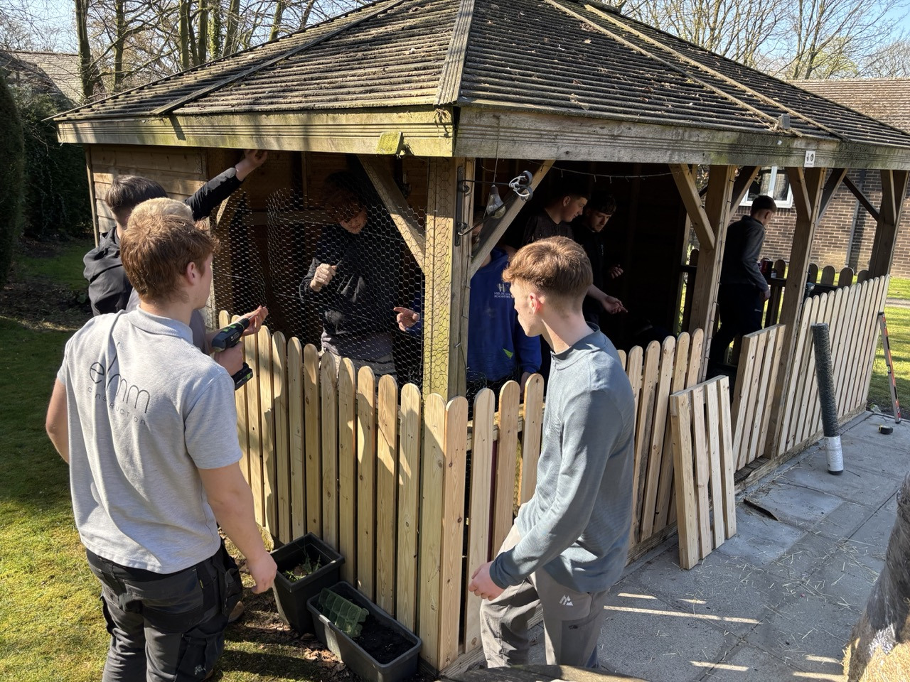 Students working on fences