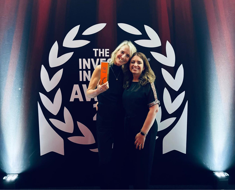 Nichola Newton and Tracy Callaghan celebrating IIP Platinum Award