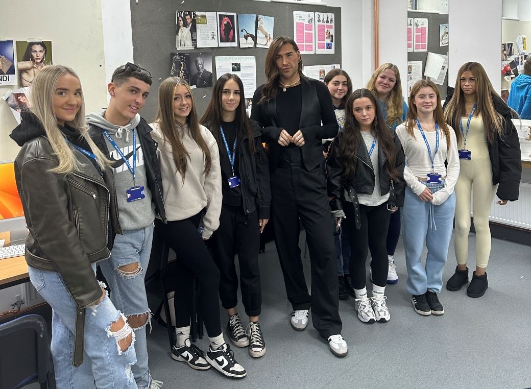Ryan with some of the college's fashion students