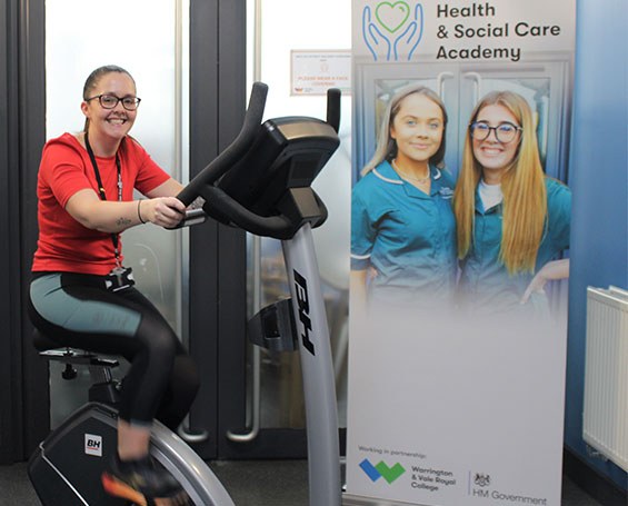 Staff member doing charity bike ride