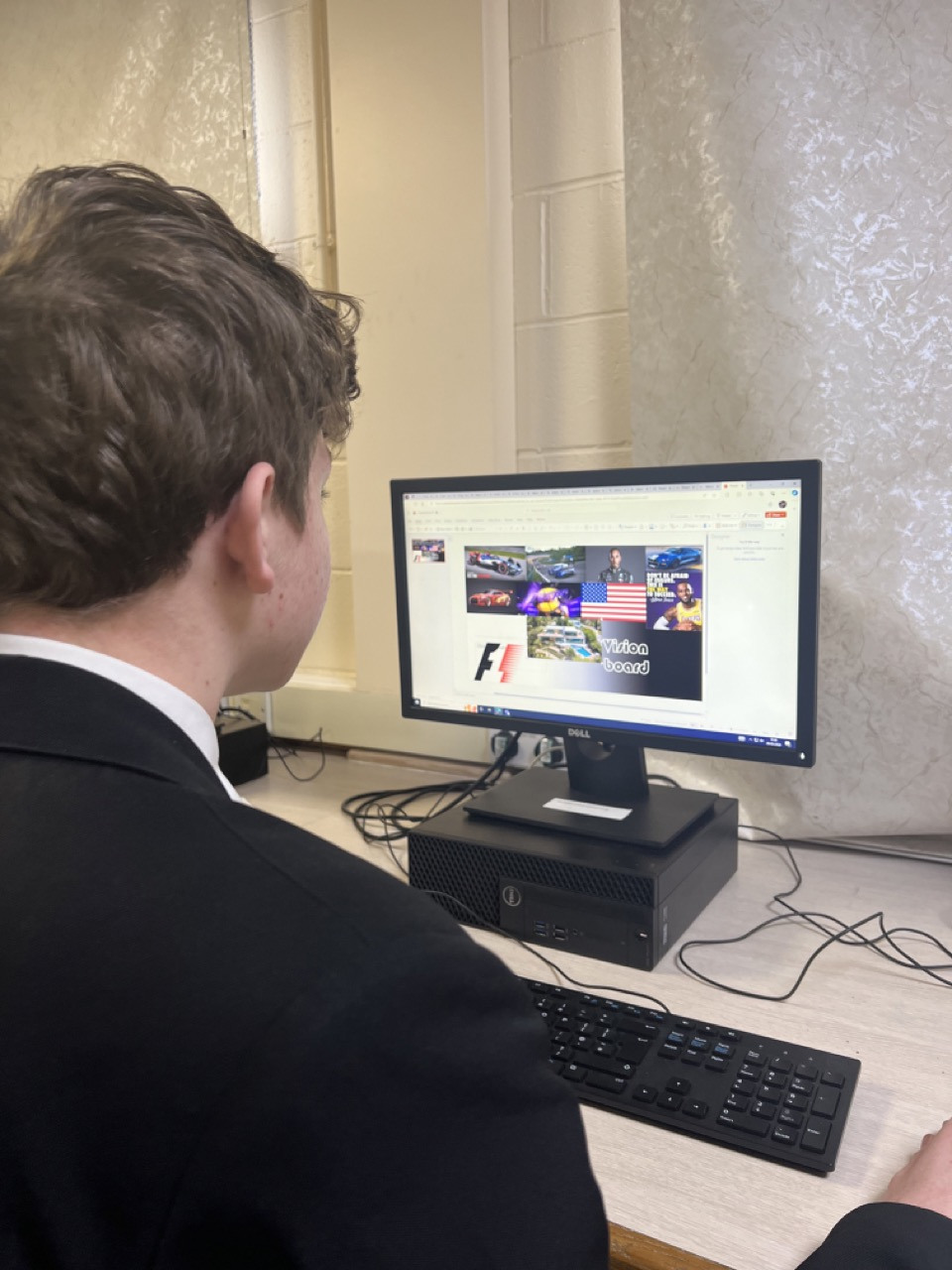 Student working on computer during Dream It Do It