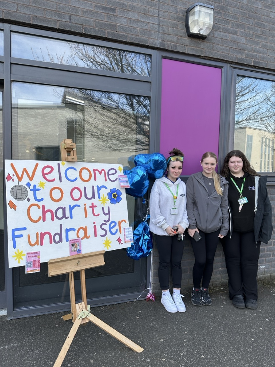 Students at the entrance to the charity event