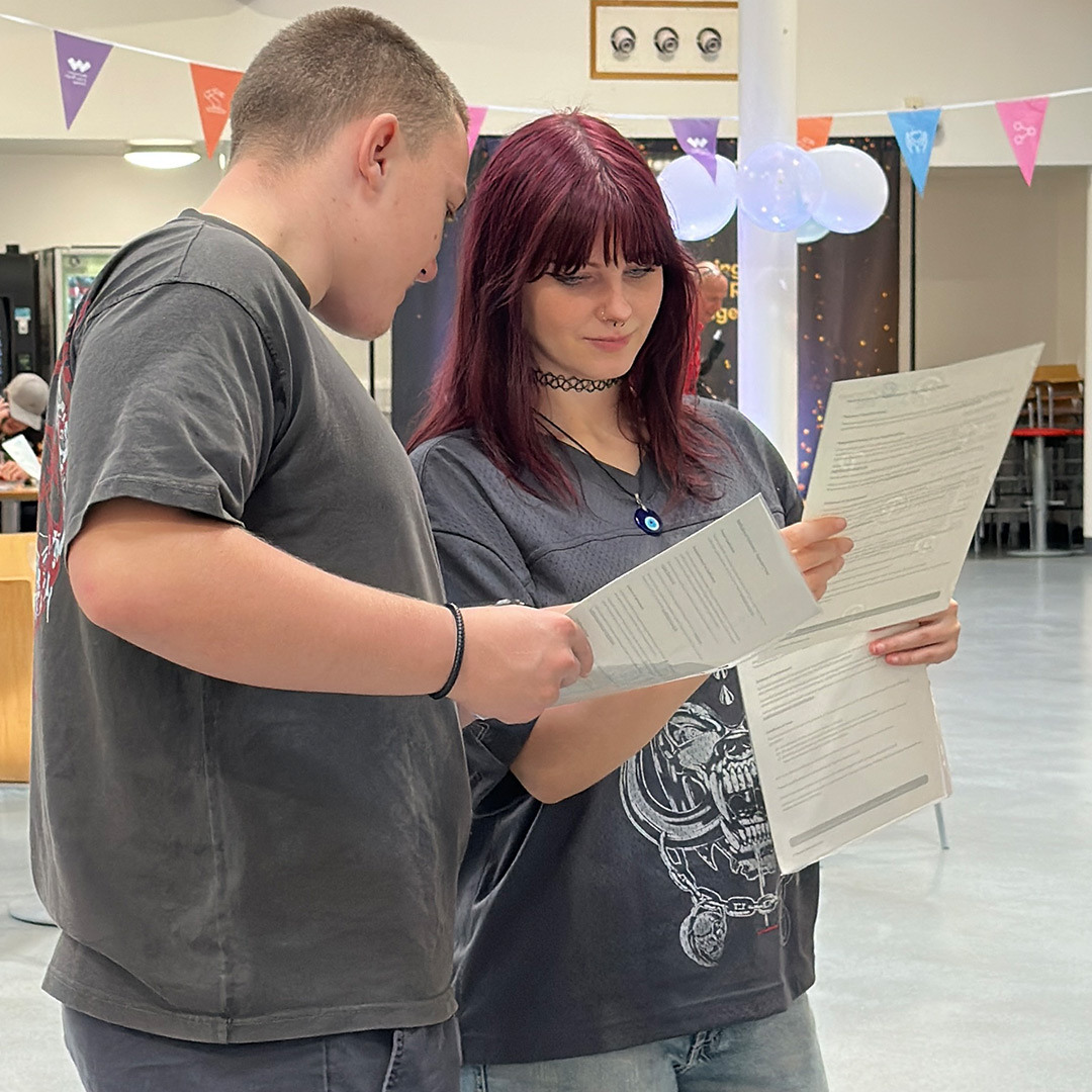 Students look at each others results