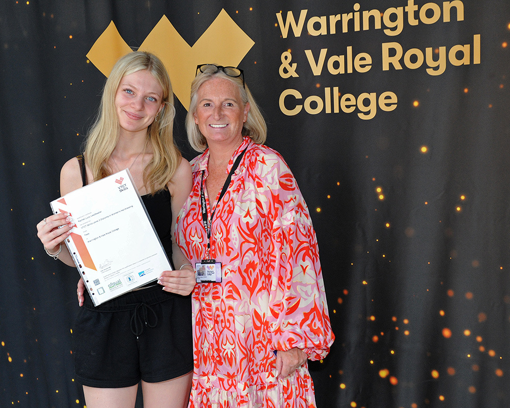 Tutor Tracy and student Rachel Leadbeater celebrate her Level 3 Hairdressing result