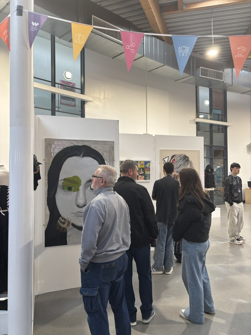 Visitors looking around exhibition End of Year Art Exhibtion Large