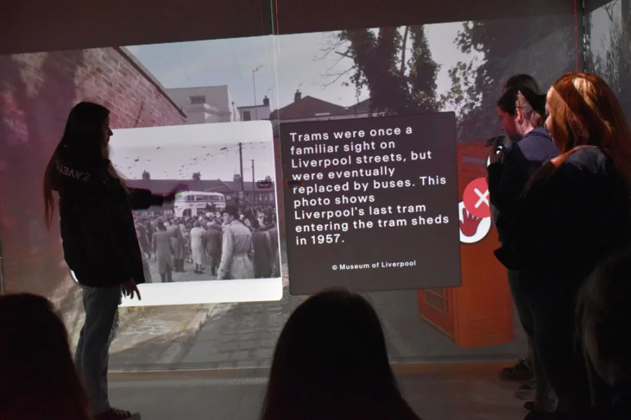 Students interacting with House of Memories Exhibition