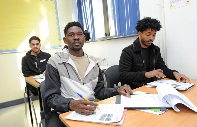 ESOL students sitting in classroom