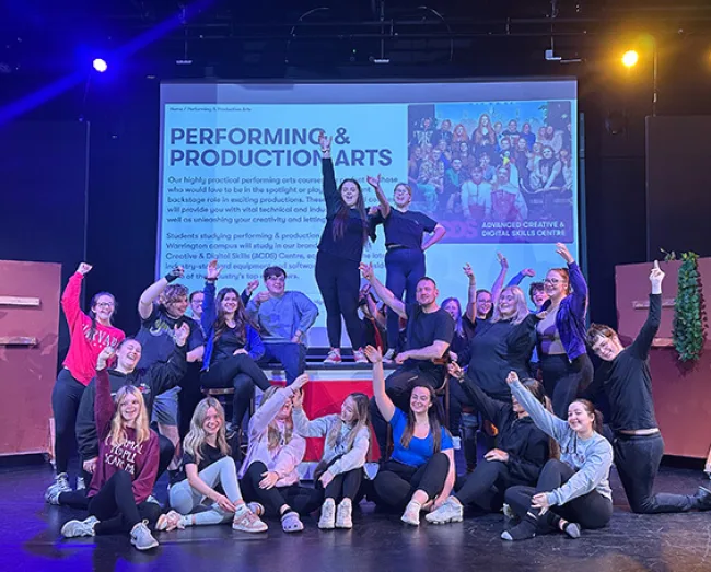 Group shot of performing arts students dressed in costume