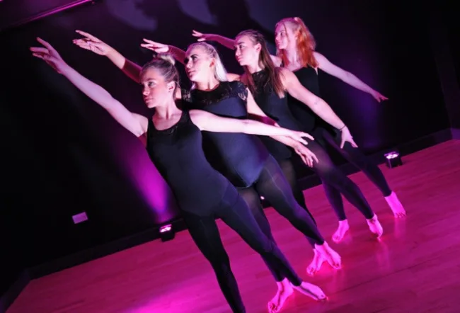 Dancers posed in a line (Performing Arts thumbnail image)