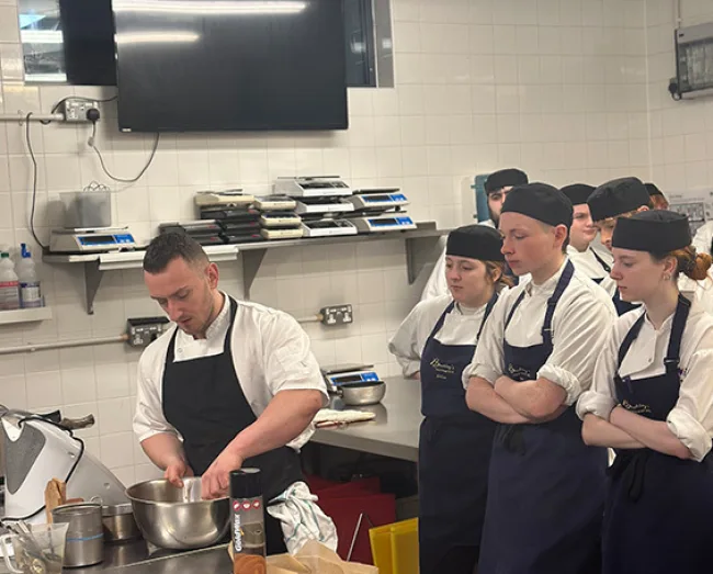 Hospitality Catering Students gather to watch guest chef