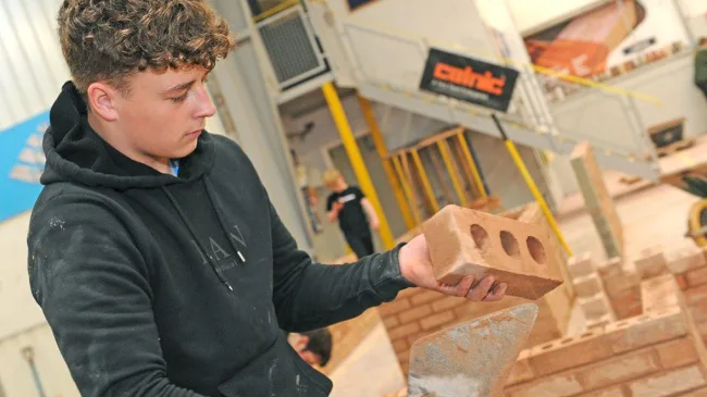 Adult brickwork student in brickwork workshop