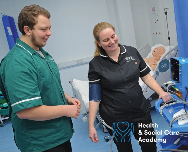 Healthcare student with tutor in hospital ward thumbnail HSCA