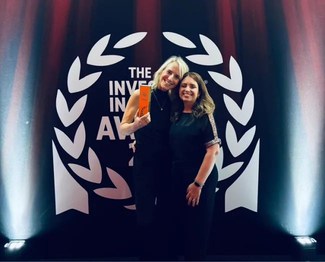 Nichola Newton and Tracy Callaghan celebrating IIP Platinum Award