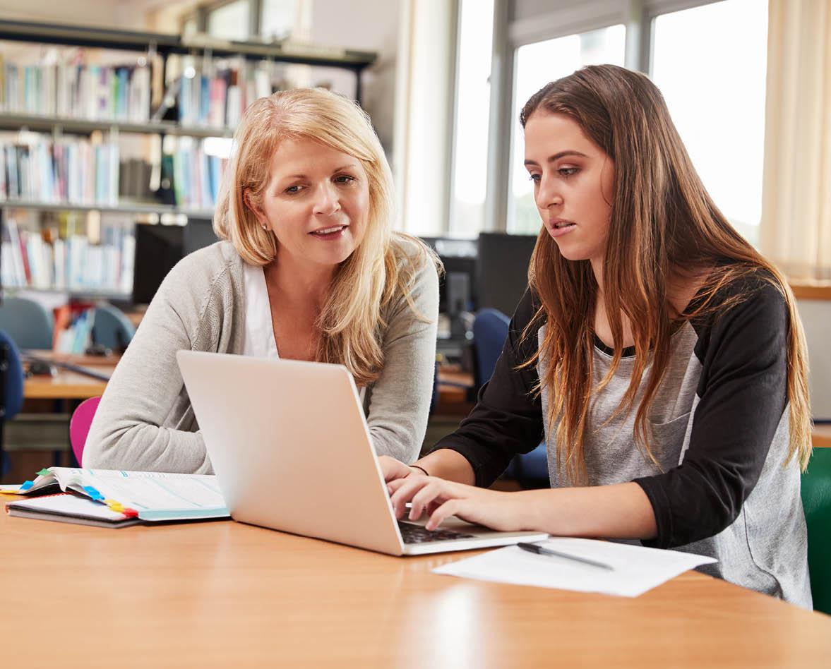 Female teacher with student learning support